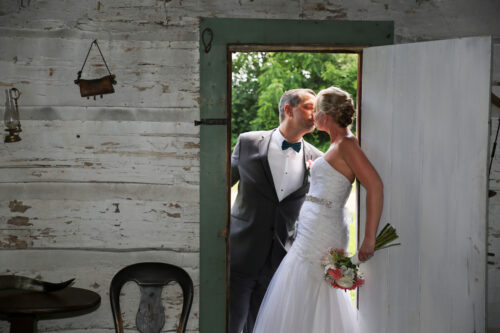 a wedding couple kissing